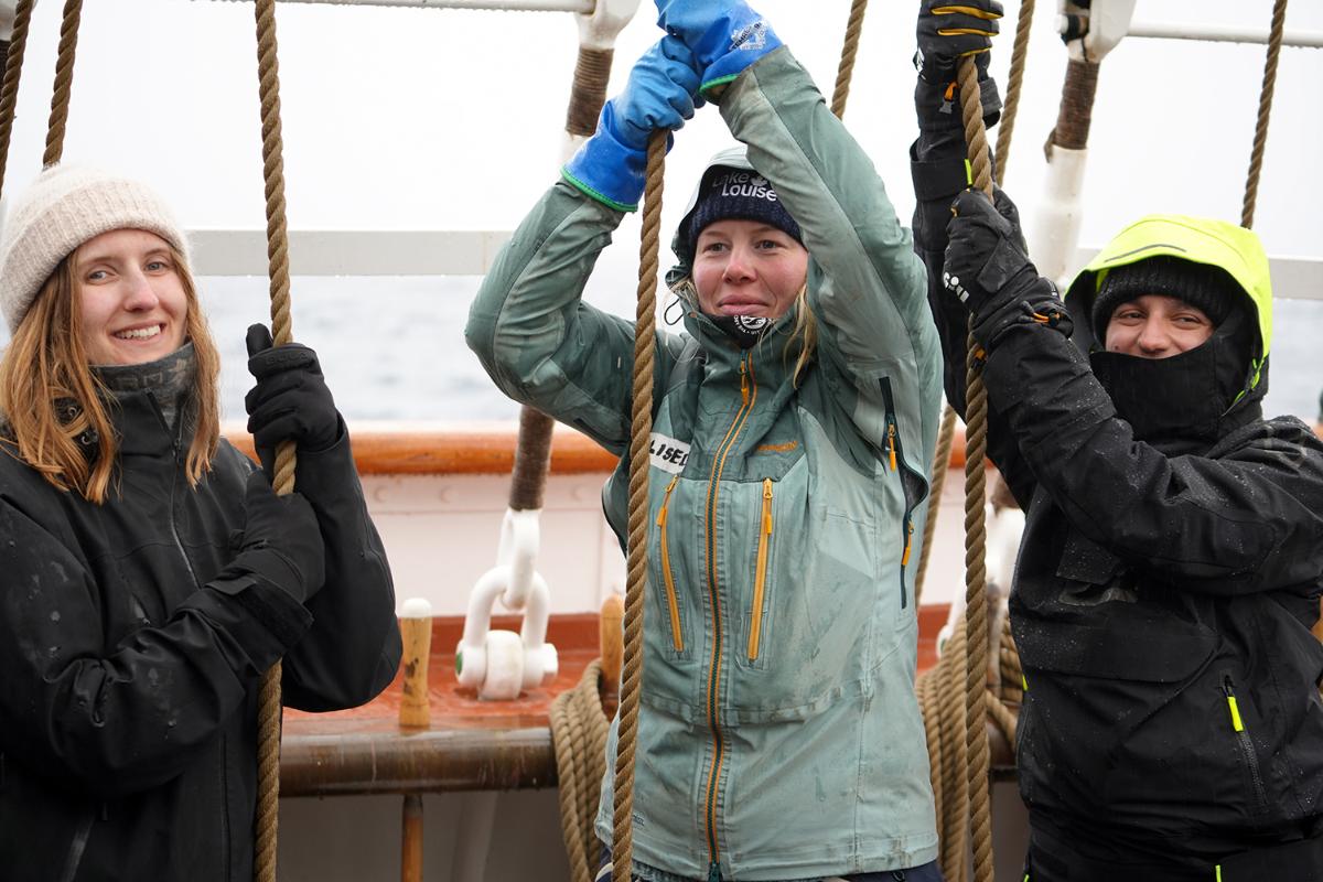 People pulling ropes