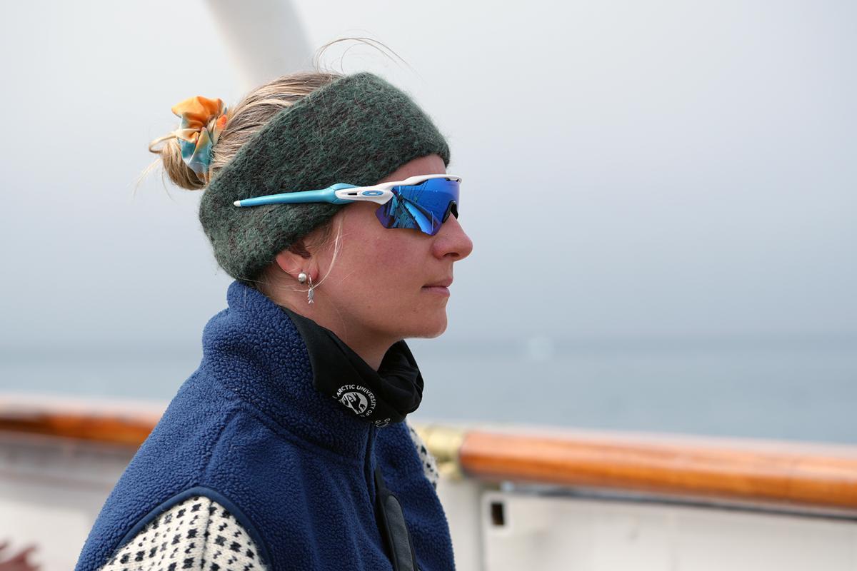 A woman looking at the sea